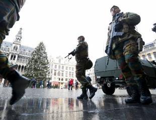 Belgium widens hunt with Brussels on maximum alert