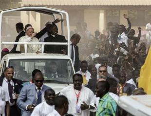 Pope says Christians, Muslims are brothers in war-torn CAfrican district