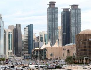 Qatar launches probe after rains exposed poor construction, bans workers from leaving country