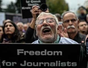 Turkish newspaper says faces tax inspection after journalists arrested