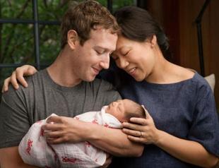 New dad Zuckerberg vows to give away Facebook fortune