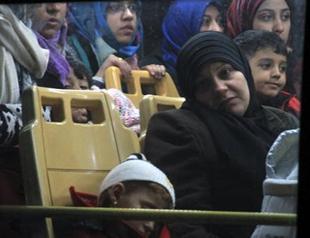 Syrian fighters, civilians arrive in Idlib after Homs ceasefire deal