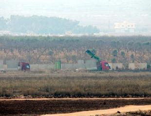 Turkey builds wall along ISIL-controlled border region