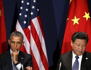 Global climate talks stumbling near finish line, as Obama, Xi talk