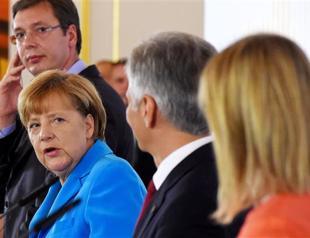 Merkel says Austrian migrant tragedy a ‘warning’