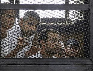 Egyptian court sentences 3 Al-Jazeera journalists to 3 years in prison