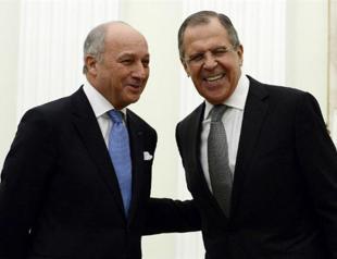 French FM says can work with Syrian regime forces after transition