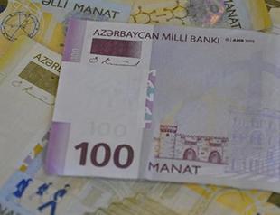 Azerbaijan devalues currency by almost 50 percent
