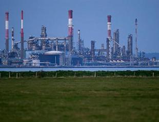 Brent oil hits 11-year low as oil extends slide on glut worries