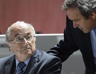 FIFA bans Blatter, Platini for eight years
