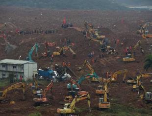 China landslide leaves 91 missing, sparks gas explosion