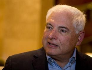 Panama court orders detention of ex-president over spying