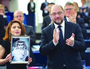 Saudi blogger’s wife accepts EU Sakharov prize for jailed husband