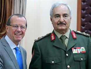 Libya’s rival parliaments sign unity government deal