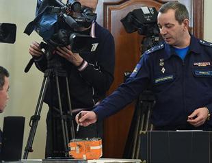 Russia experts examine black box of jet downed by Turkey