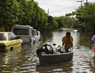 At least 53 killed in storms, floods hitting Americas