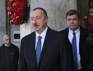 Azeri leader says cheap oil made manat devaluation inevitable