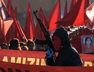 Masked, armed militants clash with police during funeral in Istanbul
