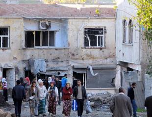 Residents return to ruined homes after siege in Silvan