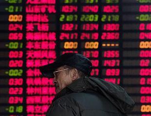 Chinese stock markets halted after shares see sharp drop