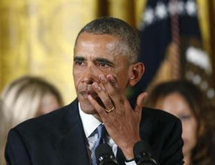 Obama, wiping tears, makes new push to tighten gun rules