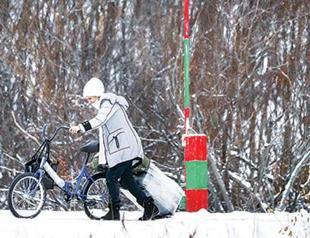 Cycling migrants to be returned by bus