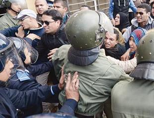 Moroccans protest over public job cuts