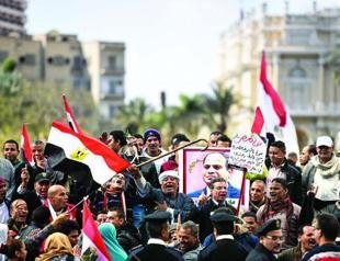 Crackdown, demo ban as Egyptians mark revolt anniversary