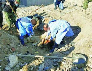 Iraq says 40 bodies found in mass grave in Ramadi