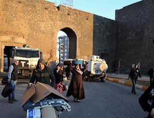 Thousands flee southeastern Sur district amid clashes