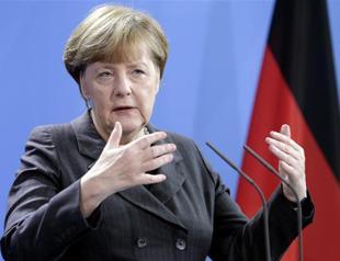 Germanys Merkel says refugees must return home once war over