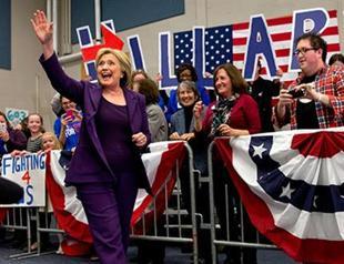 Clinton takes Iowa, beating back Sanders strong challenge