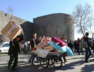 Locals flee conflict-hit southeastern town as curfew lifted