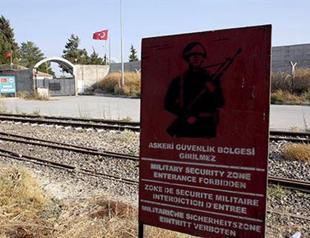 Walls and watchtowers rise as Turkey tries to seal border against ISIL