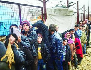 Turkey to take in more Syrians as numbers surge on border