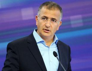 Turkish journalist wanted on terrorism charges