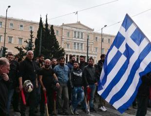 Greece, lenders should conclude first bailout review the soonest-govt