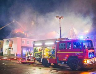 German officials horrified by anti-migrant mobs in eastern state