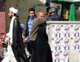 Moderates test hardliners’ grip on power in Iran vote