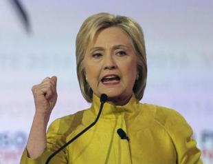 Clinton slams Sanders promises in debate