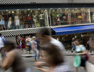 Moody’s cuts Brazil credit rating to junk