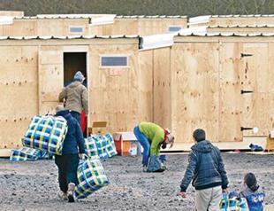 New refugee camp opens in northern France as ‘Jungle’ demolition resumes