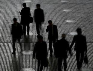 German unemployment at record low despite refugee influx