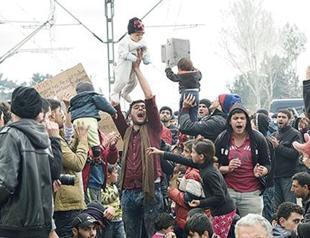 Greece steps up efforts to move migrants to sheltered camps