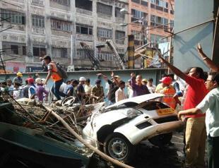 India flyover collapse kills 14, with scores feared trapped