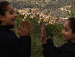 To flee Lebanons trash crisis, family heads to Syria