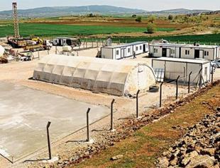 Turkish villagers rally against refugee camp plans, citing fear of Sunni extremists