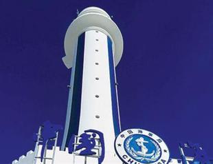 China opens lighthouse on contested artificial island