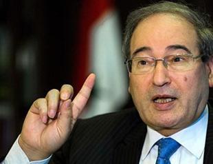 Top Syrian official rules out Assad departure