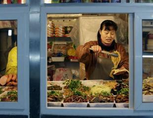 China shelves plan to regulate halal food preparation